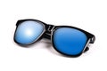 Black sunglasses with blue sky reflection Royalty Free Stock Photo