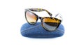 Black sunglasses in jean case Royalty Free Stock Photo