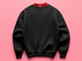 A black sweatshirt on a pink background Royalty Free Stock Photo