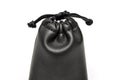 Black synthetic leather pouch for accessories and fashion apparels studio photo