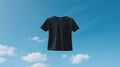 Black T-Shirt 3D Render Against Blue Sky with Clouds Background Image Royalty Free Stock Photo