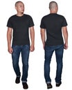 Black t-shirt mock up, front and back view, isolated. Male model wear plain black shirt mockup Royalty Free Stock Photo