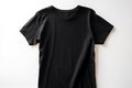 Black t-shirt isolated on white background. Mock up for design Ai generative Royalty Free Stock Photo