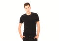 Black t shirt on young handsome man template on white background. Copy space. Mock up Royalty Free Stock Photo