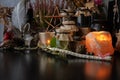 Black table with magic items, candles, pentacle star, magic wand. Space for the text.