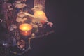 Black table with magic items, candles, pentacle star, magic wand. Space for text. Toned to cold colors