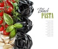 Black Tagliatelle pasta with cherry tomatoes, garlic and herbs Royalty Free Stock Photo