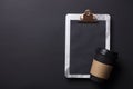 Black take away coffee cup and clipboard blank menu Royalty Free Stock Photo