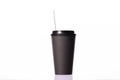 Black take away disposable paper coffee cup with plastic cap and paper straw Royalty Free Stock Photo