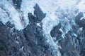 Black tall cliff with ice and waterfall begining of the glacier in Mt Cook National Park. I Royalty Free Stock Photo