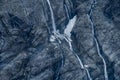 Black tall cliff with ice and waterfall begining of the glacier in Mt Cook National Park. I Royalty Free Stock Photo