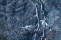 Black tall cliff with ice and waterfall begining of the glacier in Mt Cook National Park. I Royalty Free Stock Photo