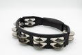A black tambourine in front of white background Royalty Free Stock Photo