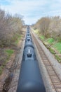 Black Tank Cars in Motion