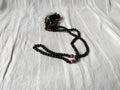 A black tasbih for Muslim prayers