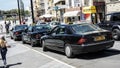 Black taxi cars on the streets of Cyprus in the summer