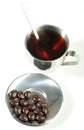 Black tea with chocolate dragees Royalty Free Stock Photo