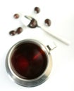 Black tea with chocolate dragees Royalty Free Stock Photo