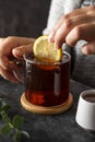 Black tea in glass cup, morning hot drink with lemon and honey Royalty Free Stock Photo