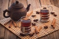 Black tea glass glasses wooden table cinnamon star anise