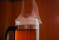 Black tea in the glass kettle steaming Royalty Free Stock Photo