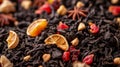 Black tea leaves with dried fruits and herbs. AI generated. Royalty Free Stock Photo