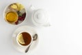 Black tea with lemon and honey on a white background. Hot tea cup isolated, top view flat lay. Flat lay. Autumn, fall or winter Royalty Free Stock Photo