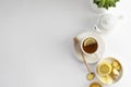 Black tea with lemon and honey on a white background. Hot tea cup isolated, top view flat lay. Flat lay. Autumn, fall or winter Royalty Free Stock Photo