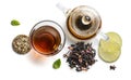Black tea with natural aromatic additives and accessories. Top view on white background Royalty Free Stock Photo