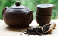 Black tea, teapot and cups on the table Royalty Free Stock Photo