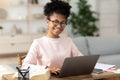 Black Teen Girl At Laptop Learning Online Sitting At Home