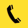 Black Telephone handset icon isolated on yellow background. Phone sign. Call support center symbol. Communication Royalty Free Stock Photo