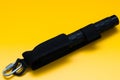 Black telescopic expandable baton / truncheon isolated