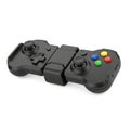 Black Telescopic Game Controller with Joysticks and Buttons on a White Background gamepad Royalty Free Stock Photo
