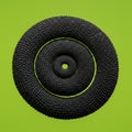A black, textured spiral resembling reptilian scales, against a bright green background. Royalty Free Stock Photo