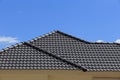 Black tiles roof on a new house Royalty Free Stock Photo