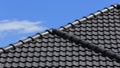 Black tiles roof on a new house Royalty Free Stock Photo