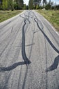 Black tire marks on the road Royalty Free Stock Photo