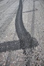 Black tire marks on the road Royalty Free Stock Photo
