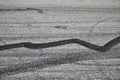 Black tire marks on the road Royalty Free Stock Photo