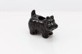 Black tooth pick holder shaped like a scottie dog