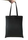 Black tote bag in hand Royalty Free Stock Photo