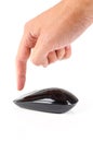 Black touch wireless modern computer mouse with finger isolated Royalty Free Stock Photo
