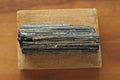 Black tourmaline stone on a background of natural wood American