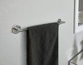 Black Towel On Chrome Bathroom Rack on grey wall