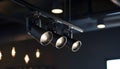Black track lighting with five spotlights. Royalty Free Stock Photo