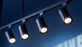 Black track lighting with five spotlights. Royalty Free Stock Photo