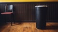 Black Trash Can On Wooden Floor: Commercial Imagery With Vibrant Color Schemes