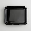 Black tray isolated on white background Royalty Free Stock Photo