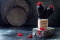 Black trendy ice cream in black waffle icecream cones with red currant berries. Royalty Free Stock Photo